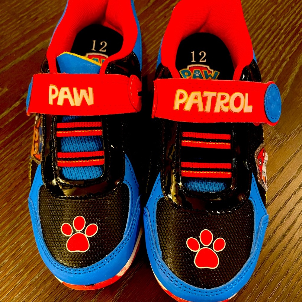 Paw patrol lite-up size 12 shoes never worn! Purchased at target.